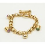 An 18ct gold bracelet, set with various semi-precious stones, L 21 cm, Total weight: ca. 36,8 g