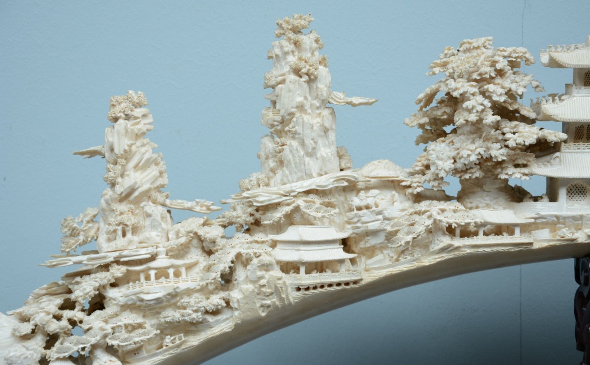 An exceptional Chinese richly carved ivory tusk, depicting various temples and pagodes in a - Image 3 of 7