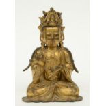 A Chinese gilt bronze Buddha, Ming, H 27,5 cm (traces of polychromy)