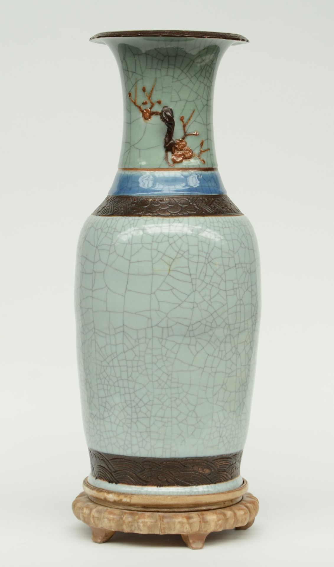 A Chinese stone- crackleware vase, relief decorated, on a matching wooden base, marked, ca. 19thC, H - Image 2 of 7