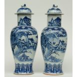 A pair of Chinese blue and white baluster shaped vases with cover, overall decorated with a river