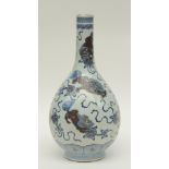 A Chinese polychrome decorated vase depicting qilins, marked, 19thC, H 51,5 cm (restoration on the