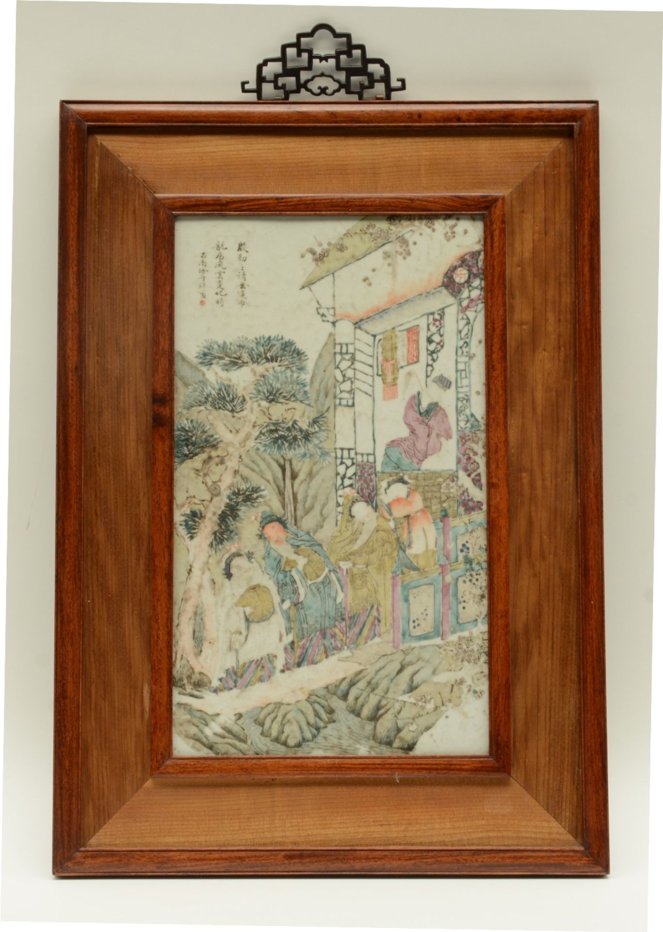 A Chinese polychrome porcelain plaque, decorated with an animated scene, signed by the artist,