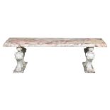 An exceptional Renaissance style Brèce Arlequino marble bench, with lion shaped Carrara marble feet,