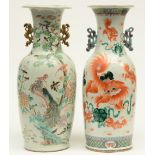 Two Chinese polychrome vases, decorated on both sides, 19thC, H 61 - 61,5 cm (chips on the rim - one