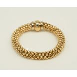 An 18ct woven gold bracelet, L 21 cm, Total weight: ca. 43 g