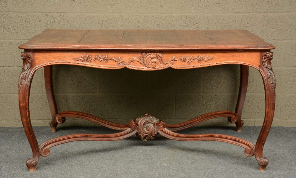 A LXV-style carved oak table, H 75,5 - W 149 - D 101 cm