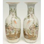 A pair of Chinese polychrome decorated vases, painted with an animated scene, signed and marked,