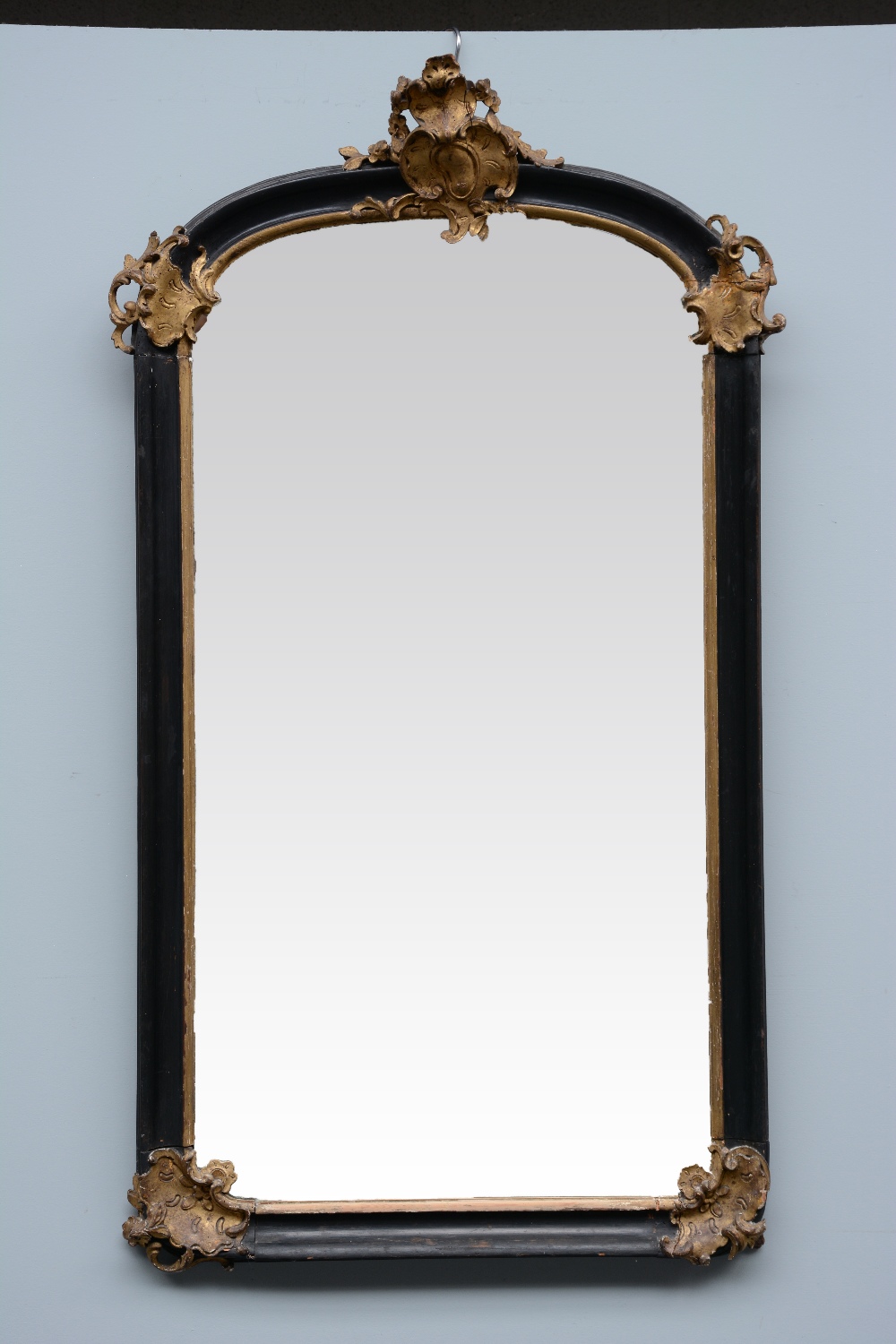 A Rococo style and period sculpted wood wall mirror, H 148 - W 83 cm