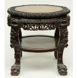 A Chinese carved hardwood stool with marble top, H 54 - Diameter 67,5 cm (scratches)