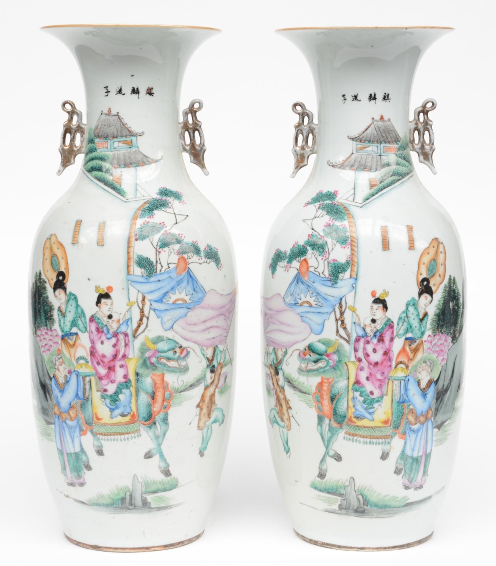 A pair of Chinese polychrome vases, depicting an animated scene, 19th C, H 58 cm, (minor hairline on