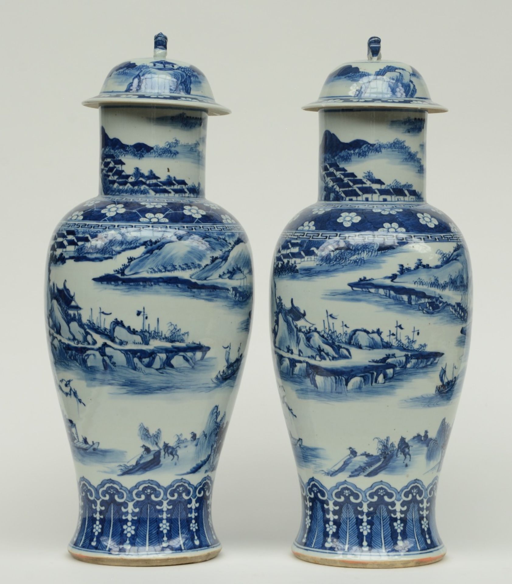 A pair of Chinese blue and white baluster shaped vases with cover, overall decorated with a river - Image 2 of 9