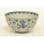 A Chinese blue and white bowl, overall decorated with lotus vines, Ming, H 9 - Diameter 17,5 cm (