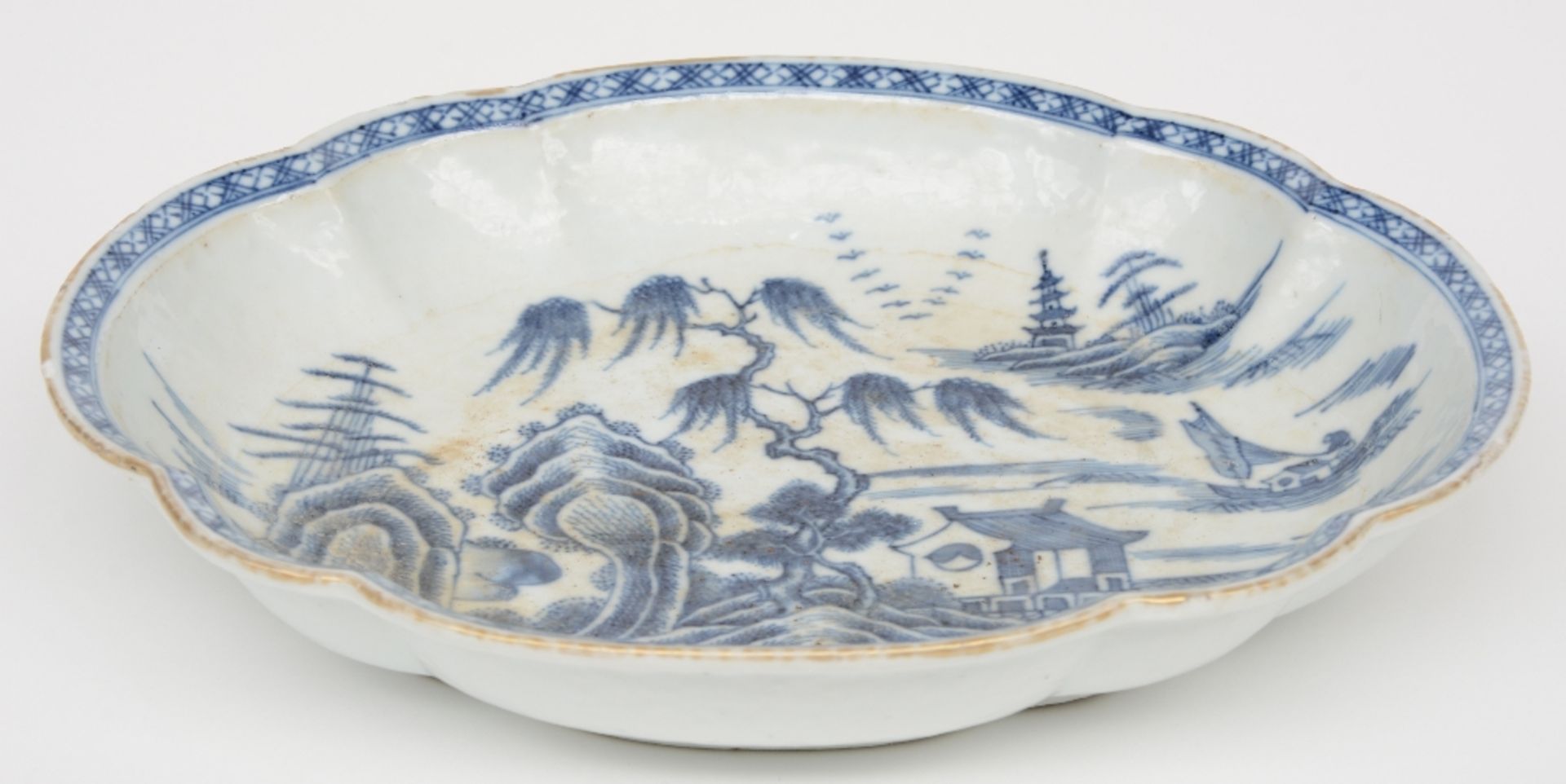 A Chinese oval dish with a profiled rim, blue and white decorated with a landscape, 18thC, - Image 3 of 4