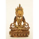 A Tibetan gilt bronze Buddha, H 20 cm