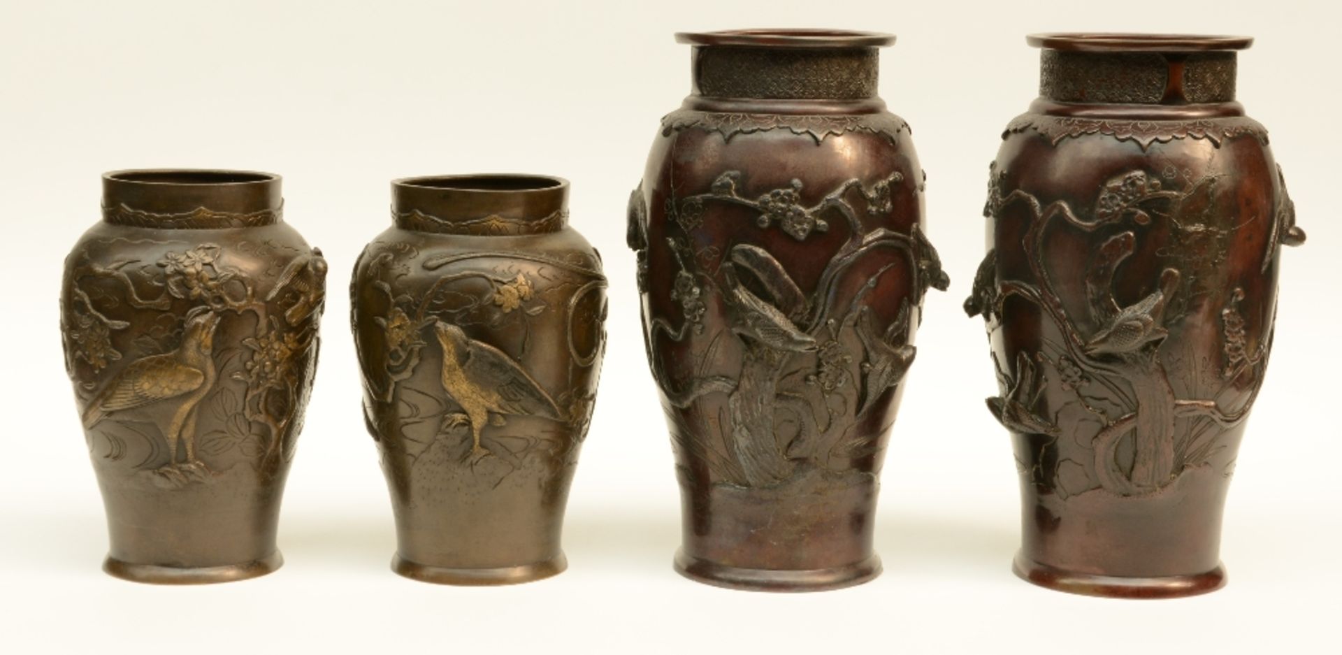 Two pair of Chinese bronze vases, relief moulded with birds on flower branches, marked, H 26 - 36