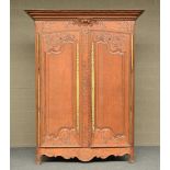 An 18thC French richly carved oak armoire, H 226,5 - W 174,5 - D 68,5 cm