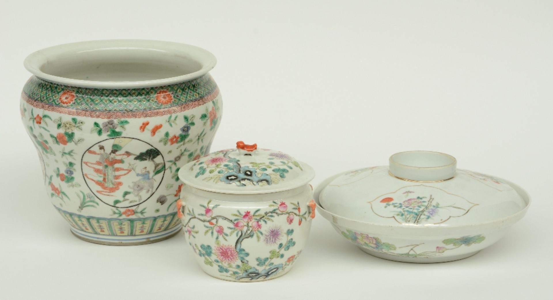 A Chinese famille verte jardinière decorated with landscapes, figures and floral motifs, 19thC;