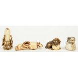 Four late Edo period Japanese ivory katabori-netsuke, three in the form of Shishi playing with a