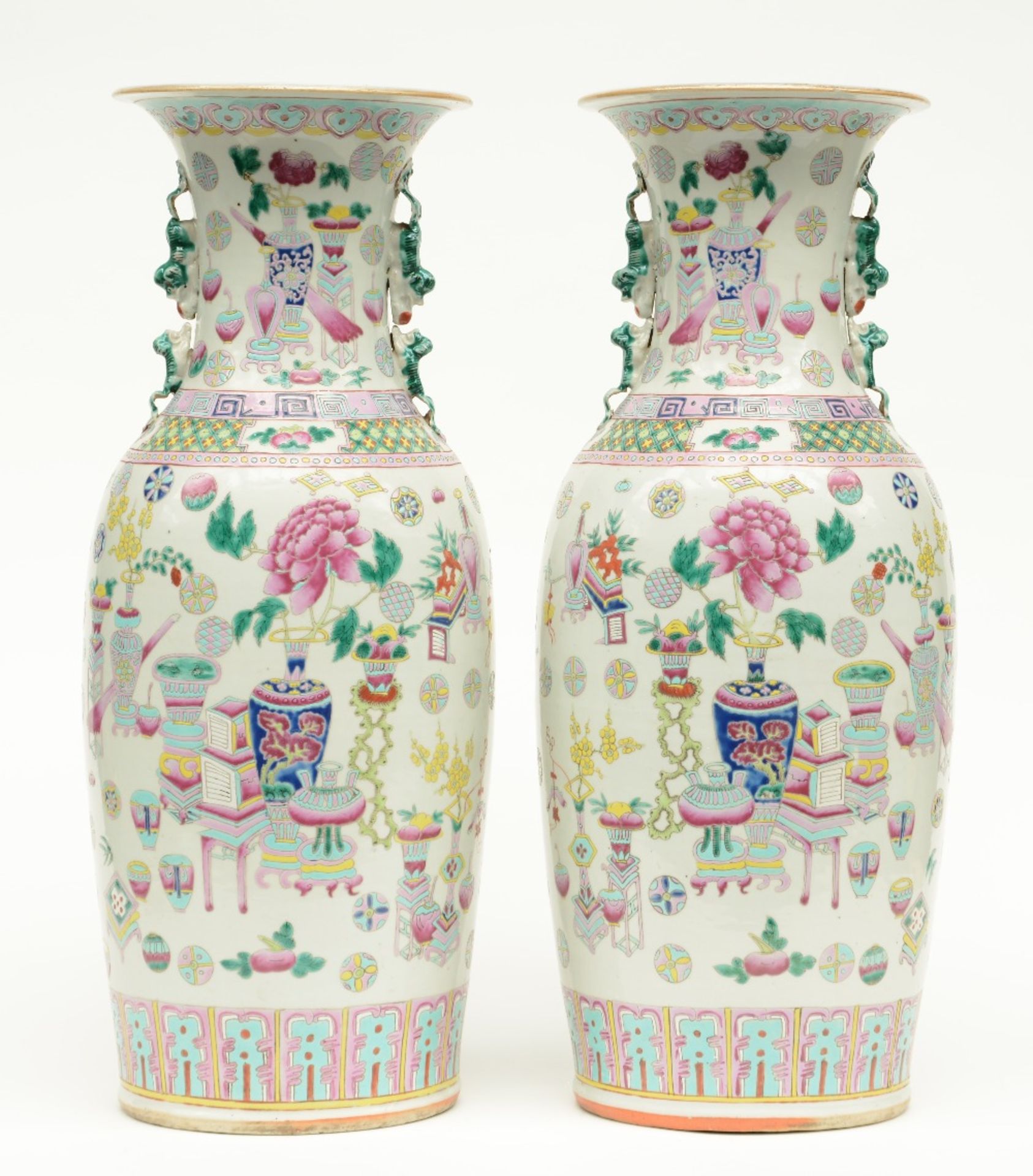 A pair of Chinese famille rose vases decorated with antiquities and symbols, 19thC, H 59 cm (one