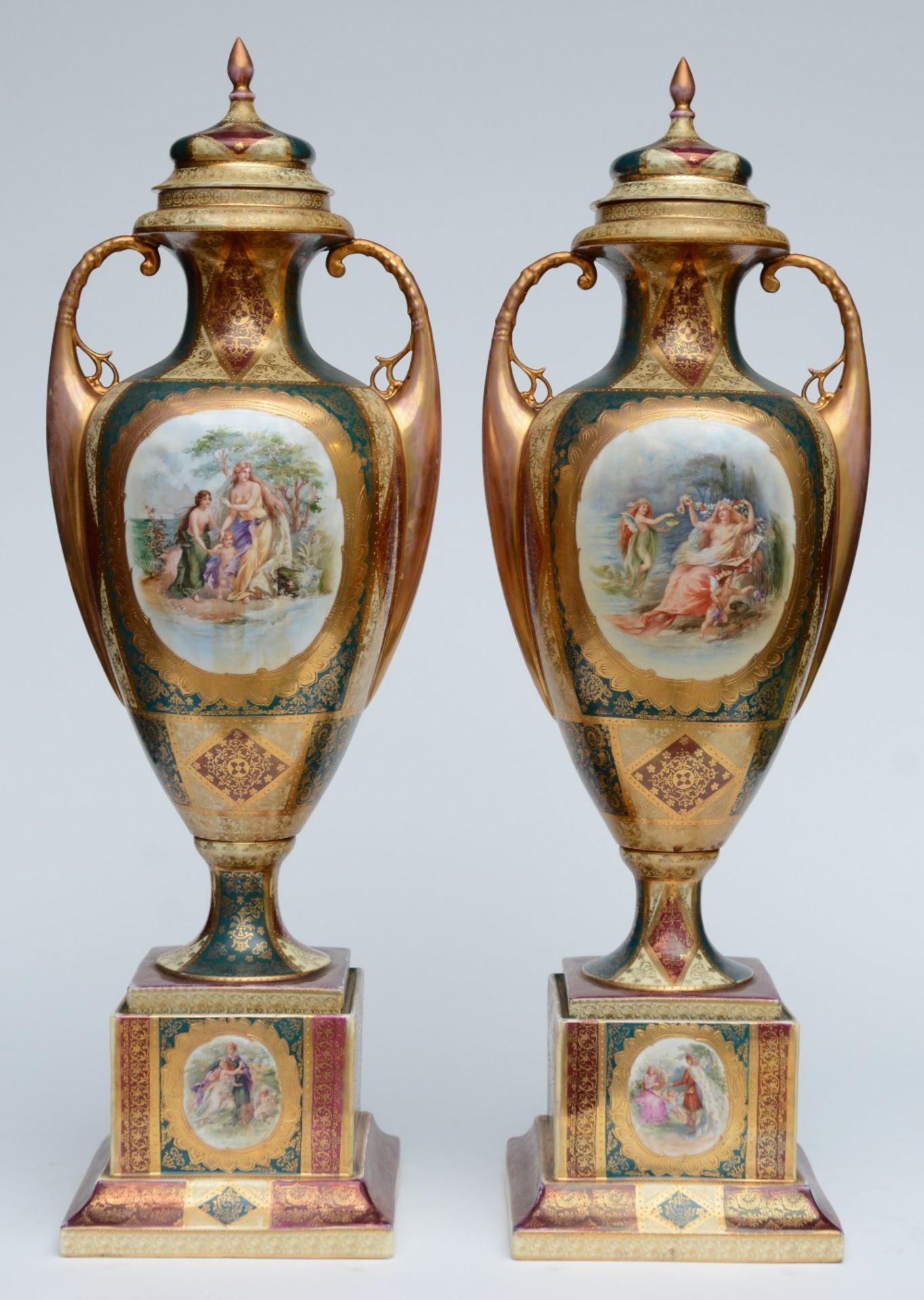 A pair of polychrome and gilt Vienna vases and covers on matching bases, late 19thC, H 78,5 cm