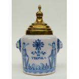 A 19thC blue and white decorated tobacco jar 'Tabac de Toenka', probably Northern France, with a