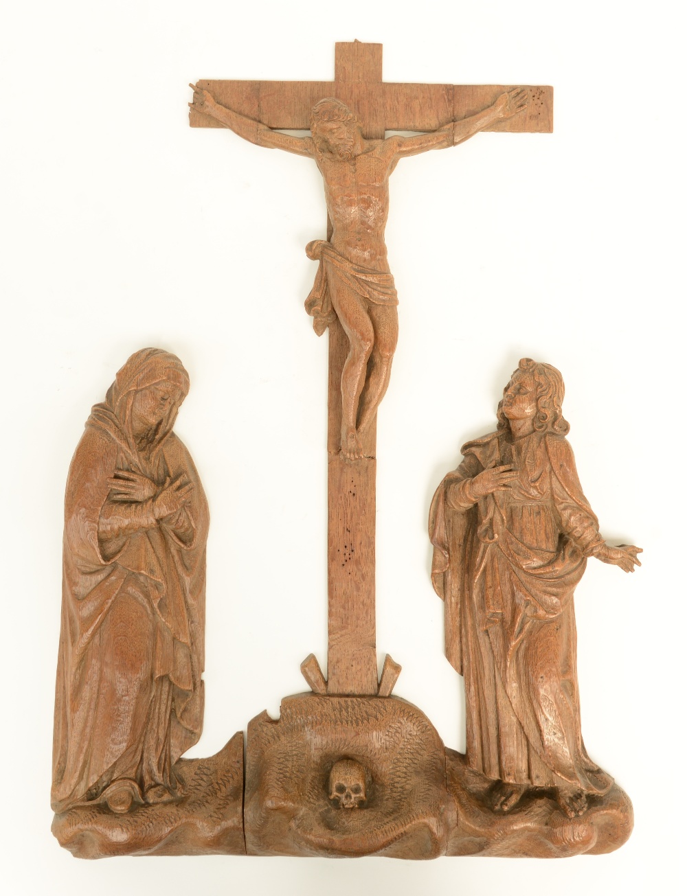 An 18thC oak Low Countries three part Golgotha group, H 58 - W 41,5 cm (restored cross)