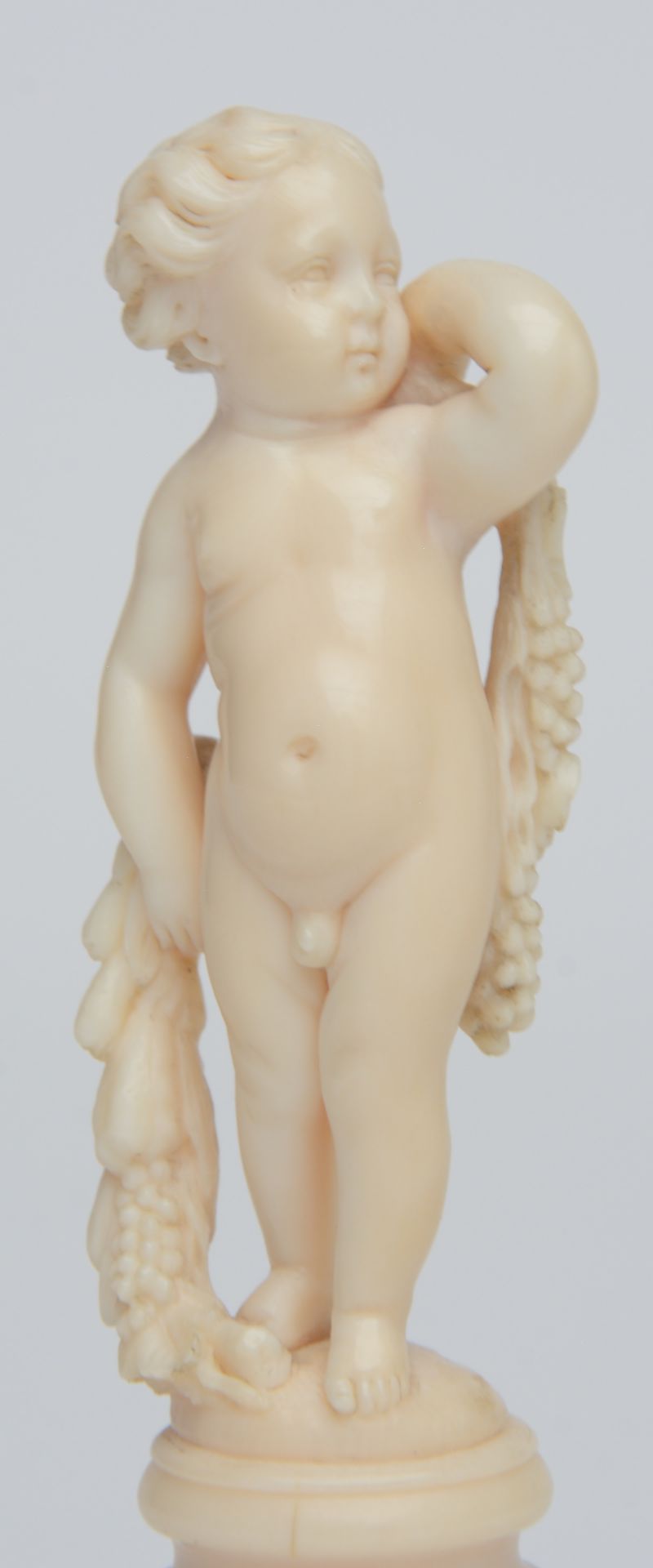 An ivory putto on a ditto base fixed on a Neoclassical Italian onice verde pedestal, Dieppe, ca. - Image 6 of 6