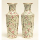 A fine pair of Chinese famille rose vases decorated with flower branches, flower baskets and bats,