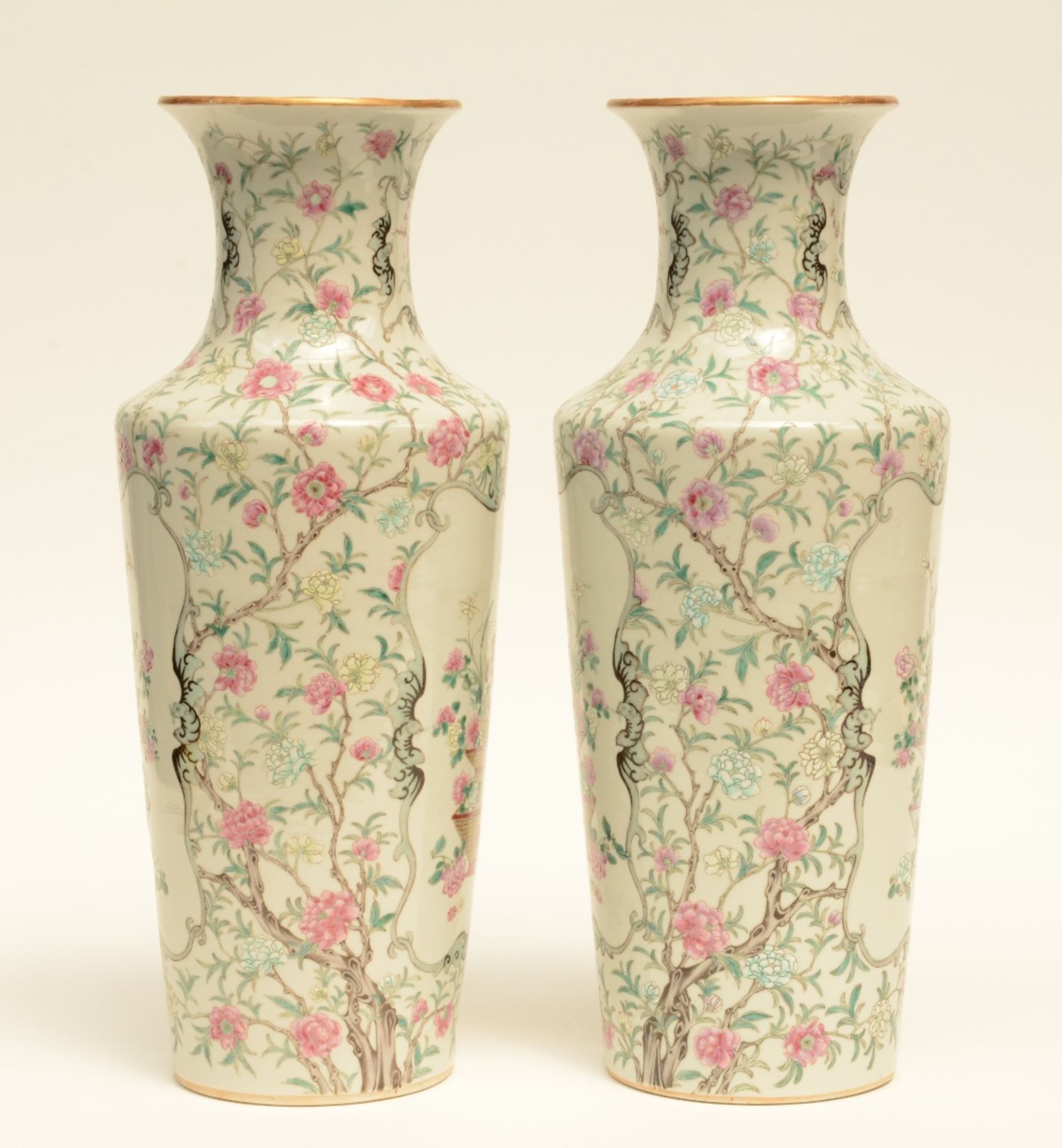 A fine pair of Chinese famille rose vases decorated with flower branches, flower baskets and bats,