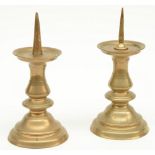 Two bronze pricket candlesticks, Low Countries, 17thC, H 23,5cm (feet missing - one prick of a later