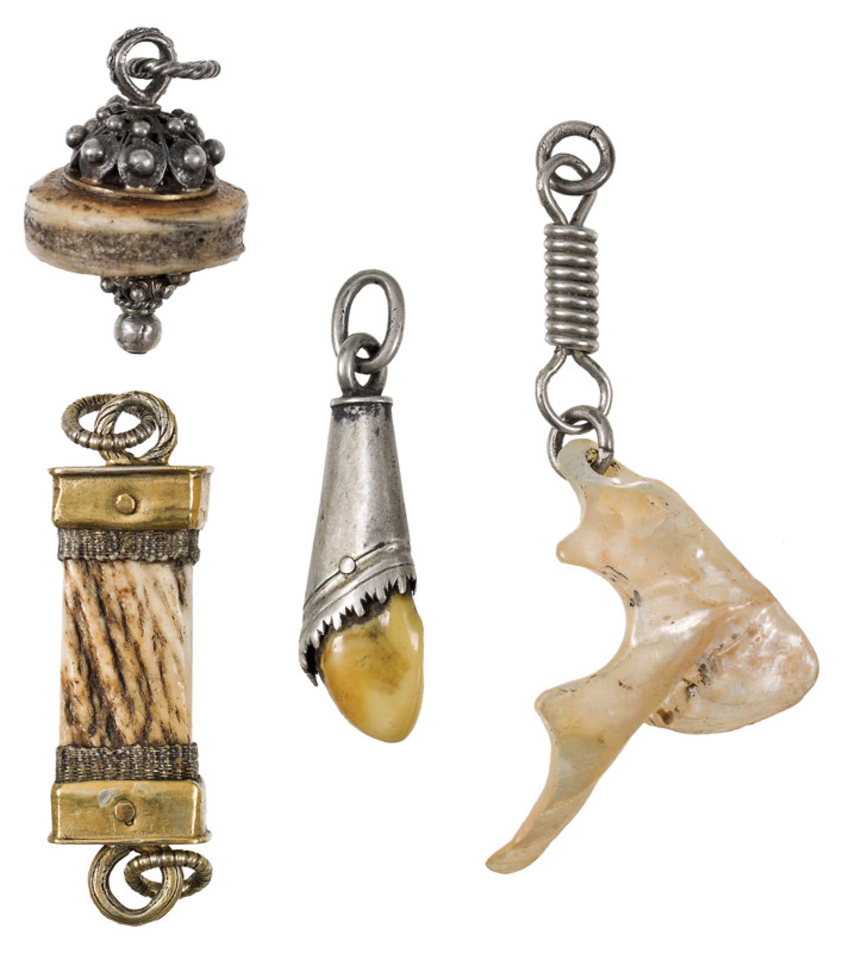 4 amulets, South German, 17th/18th century bone, tooth, nacre, silver, partly gilded; l. 3 to 4