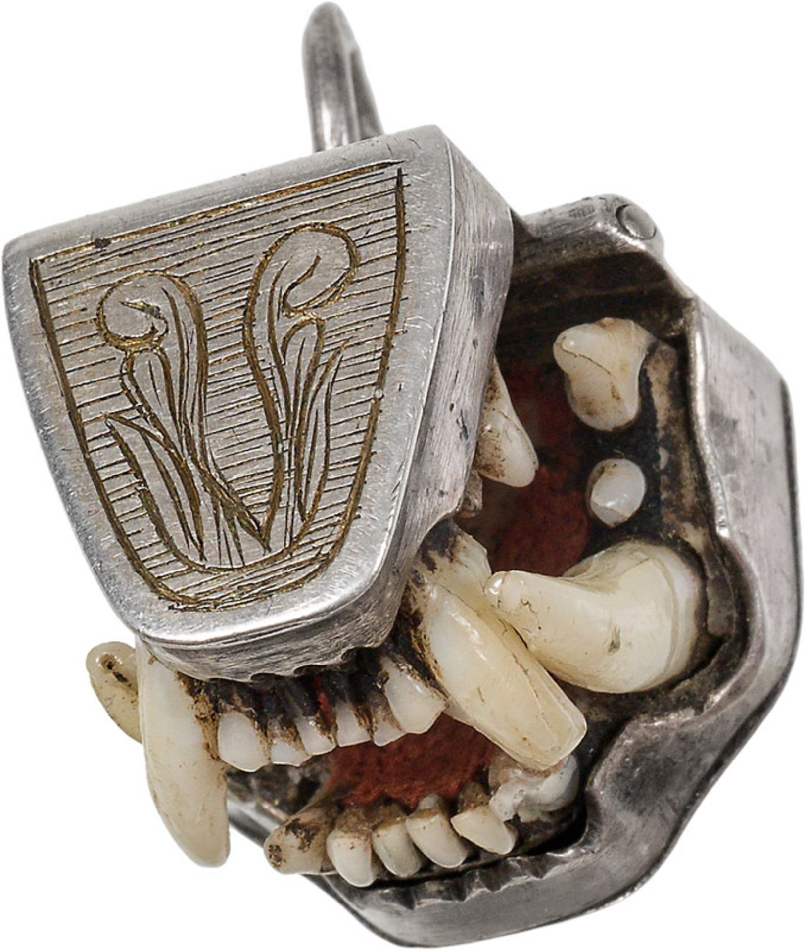 Amulet with teeth of a marten, Austria, 18/19th century teeth, silver; c. 2 × 2 × 2 cmViennese