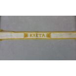 Ärmelband "Kreta", gestickte Ausführung. Länge ca. 35 cm, am linken oberen Rand ist die Naht gelöst.