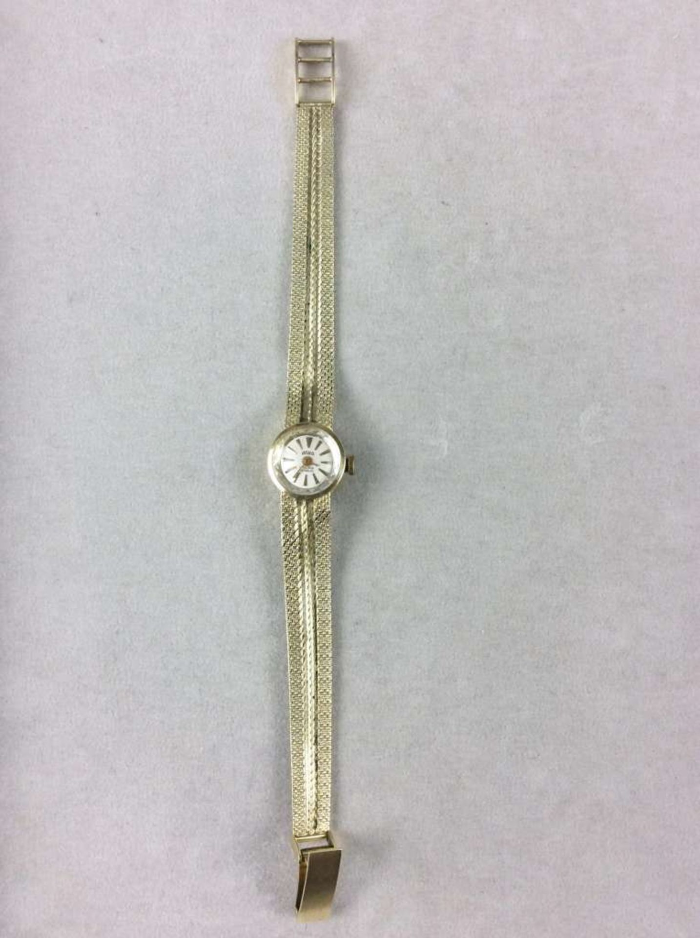 Afra-Damenarmbanduhr aus 585er-Gelbgold, rundes Ziffernblatt, mechanisches Uhrwerk/Handaufzug.