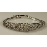 Armband, Art Deco, um 1930, WG 750, rhodiniert, 7 Brillanten zus. ca. 0.65 ct., etwa w/p, 54