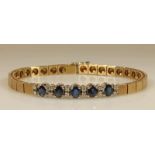 Armband, WG/GG 585, 5 ovale facettierte Saphire zus. lt. Punzierung 2.86 ct., 12 Besatz-Diamanten