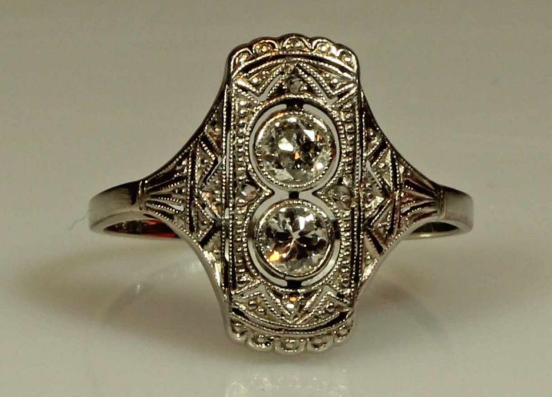 Ring, Art Deco, um 1930, WG 585, 2 Altschliff-Diamanten, 1 g, RM 16 20.00 % buyer's premium on the