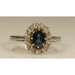 Ring, WG 585, 1 oval facettierter Saphir, 12 Besatz-Diamanten zus. ca. 0.18 ct., 3 g, RM 19.5 20.