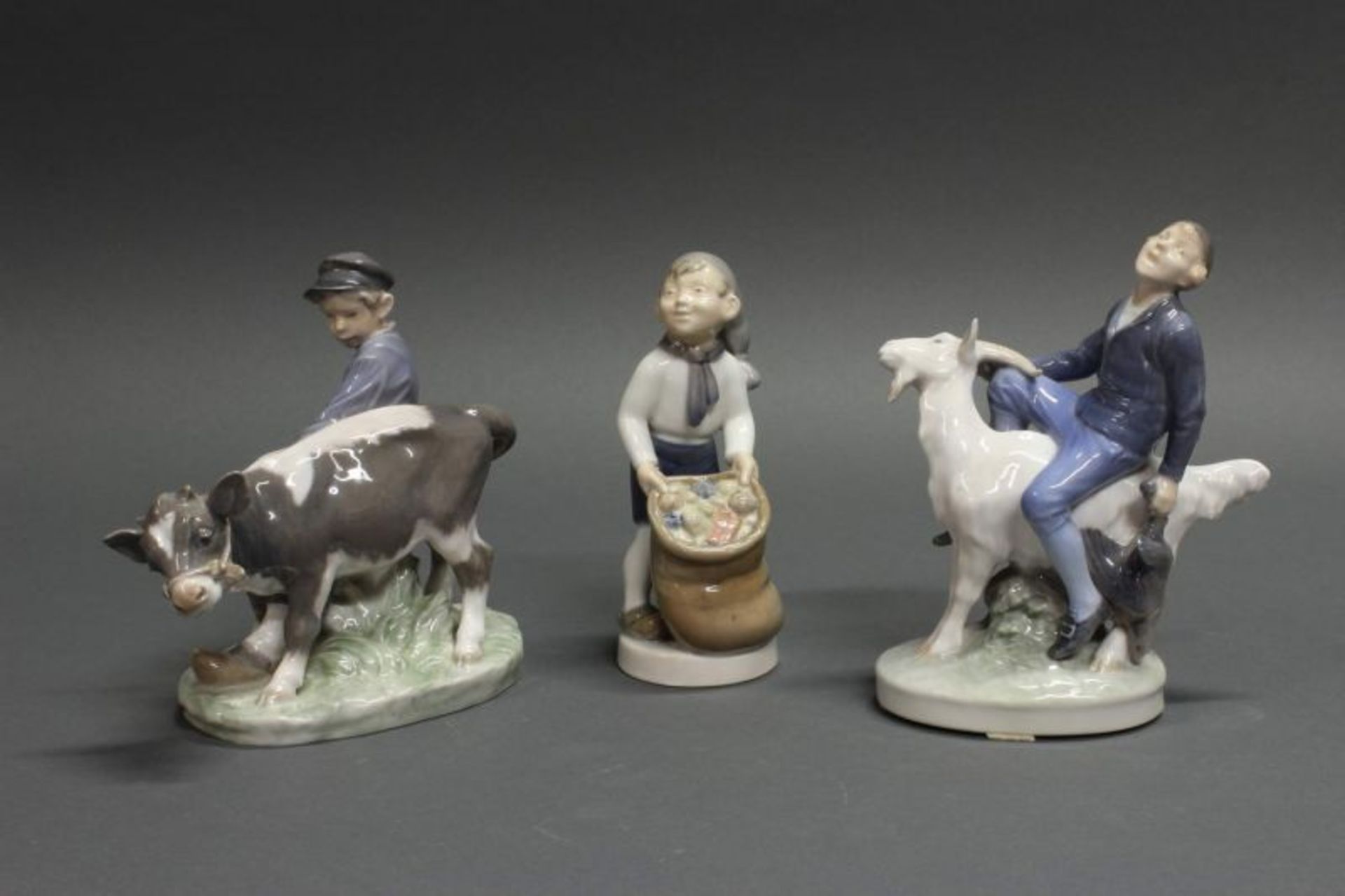 3 Porzellanfiguren, "Hirtenjunge mit Kälbchen", "Hans im Glück", "Dezember-Junge mit