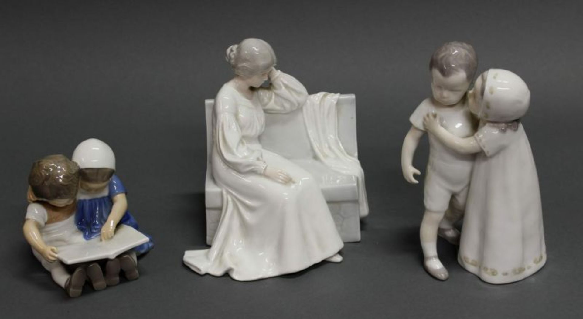3 Porzellanfiguren, "Lesendes Kinderpaar", "Dame auf einer Bank", "Verschmähte Liebe", Bing &
