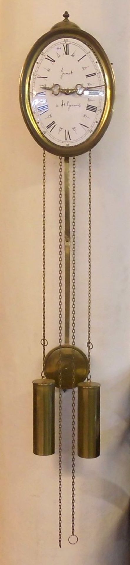 WANDUHR in der Art einer Comtoise / clock, Eisengehäuse mit bekrönender Glocke, ovales