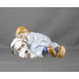 HENTSCHEL - KIND: "Kind, auf einem Hund liegend" / porcelainfigure, Entwurf Julius Konrad