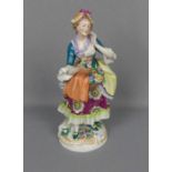 FIGUR / porcelainfigure: "Blumenhändlerin", Porzellan, Manufaktur Sitzendorf / Thüringen, 2.