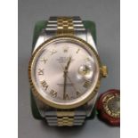 ROLEX OYSTER PERPETUAL DATEJUST - HERRENARMBANDUHR / wristwatch, Uhr und Band Stahl und 18 kt.