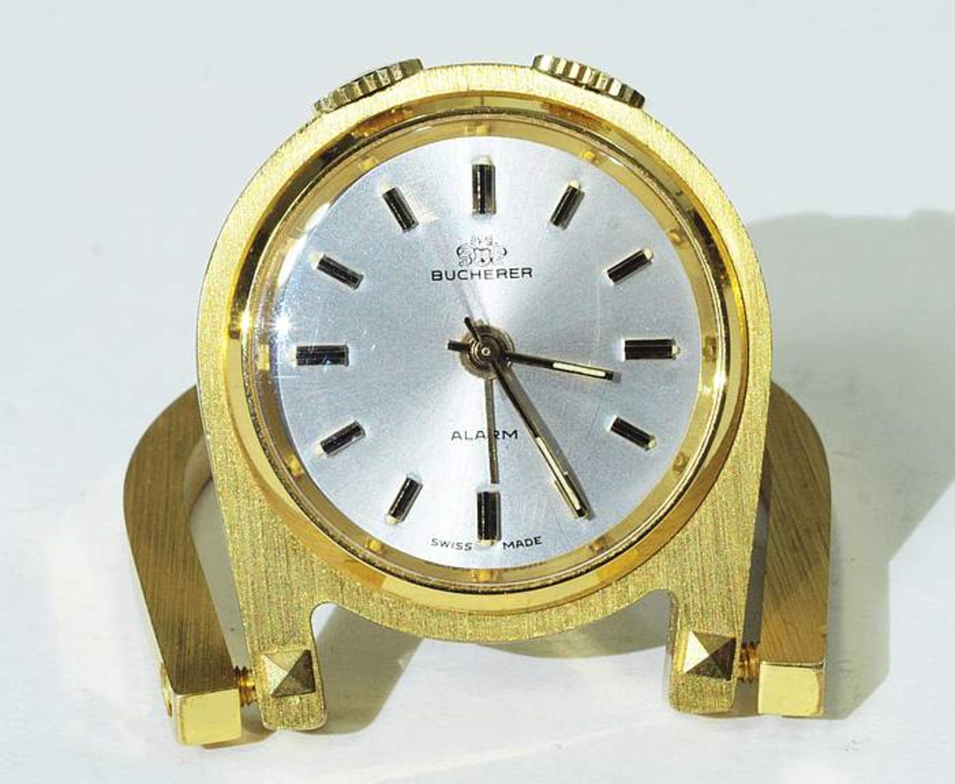 Reisewecker. BUCHERER. Reisewecker. BUCHERER, Swiss Made. Vergoldetes Messinggehäuse in