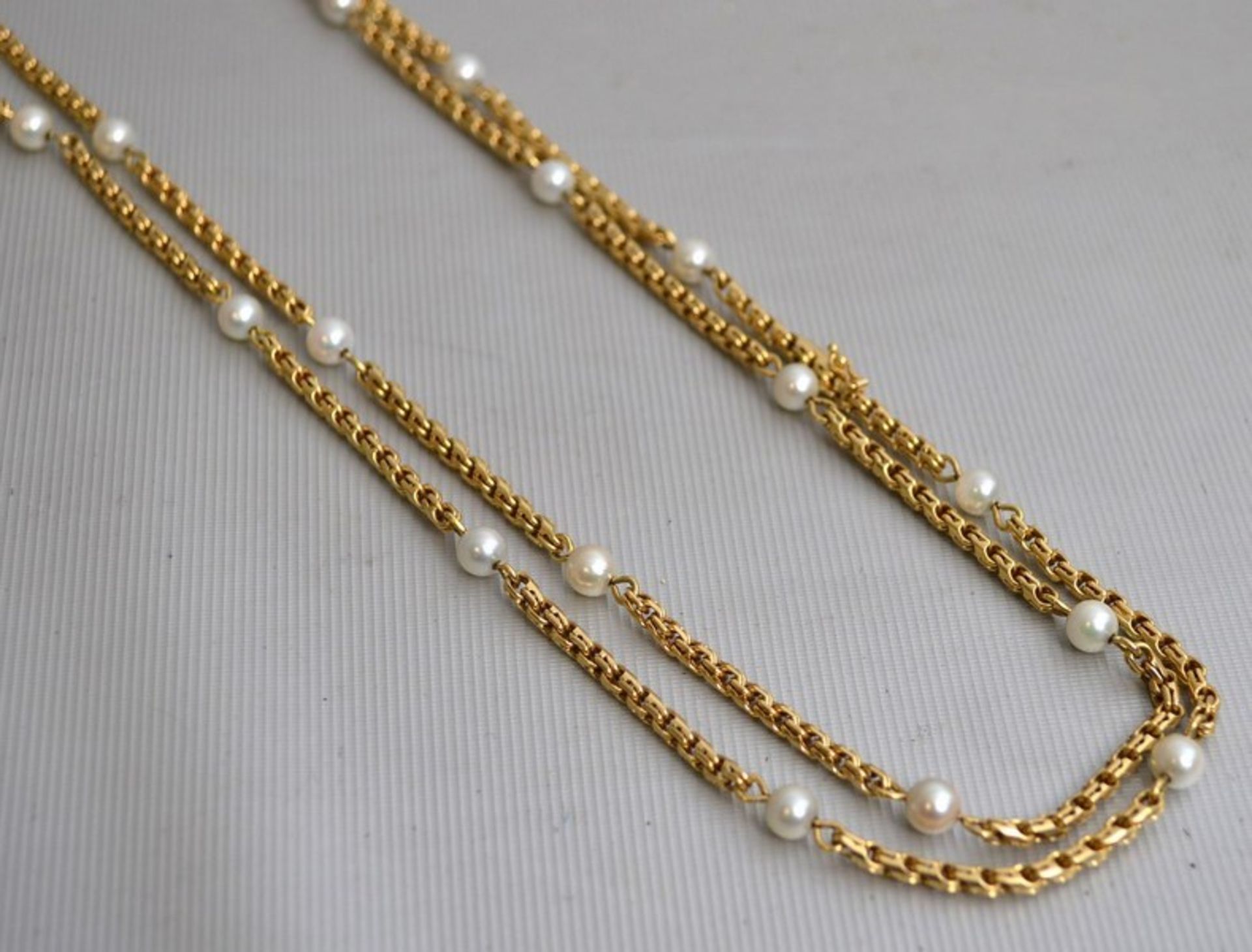 Halskette 14 kt. Gelbgold, mit 21 Perlen, Gesamtgewicht 98,9 g, L 106 cm