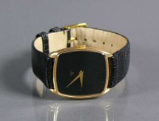 Armbanduhr BAUME & MERCIER, Geneve; 18ct GG-Gehäuse; schwarzes Ziffernblatt und Goldzeiger;