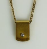 Anhänger 18ct GG; Blattform; mit 1 Brillant von ca. 0,20ct; 22,3g; an 14ct GG-Kette; 19g; L: ca.