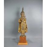 Buddha (wohl Thailand, 18./19. Jh.) Bronze vergoldet auf Lack; stehend; H: mit Sockel: 78 cm;
